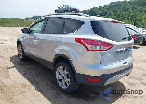 2014 Ford Escape Titanium z USA, uszkodzony, nr VIN 1FMCU9J90EUB13882